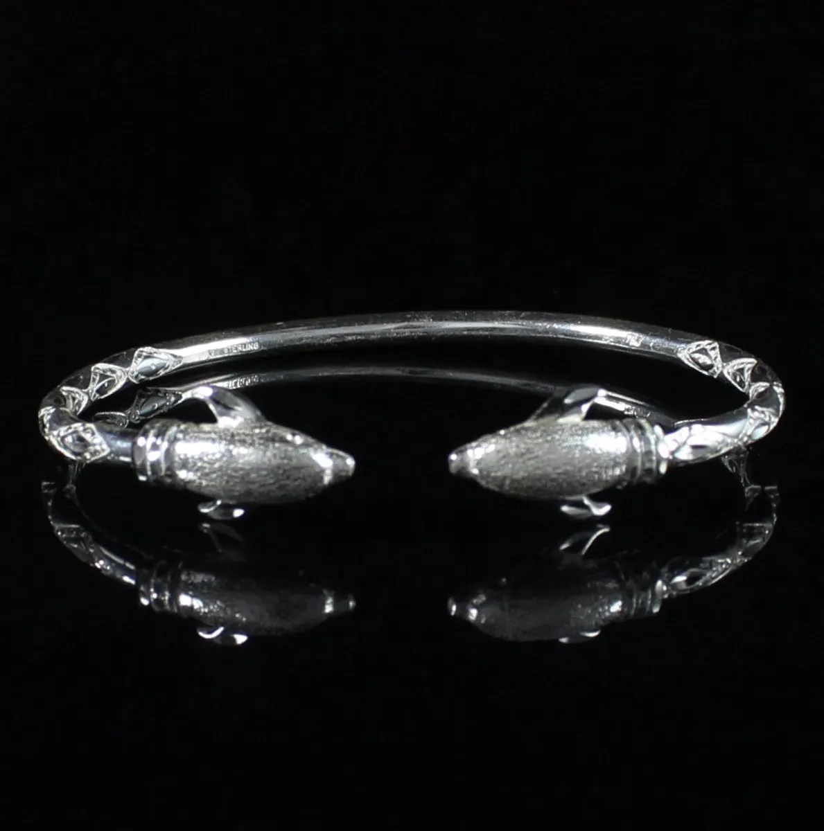 Heavy  Bangle with Dolphins with Diamante Pattern